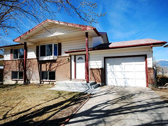 "Beautifully maintained & updated bi-level situated on a fabulous view lot in Widefield"