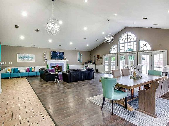 The clubhouse is available to residents and includes a full kitchen, fireplace, and dining area.