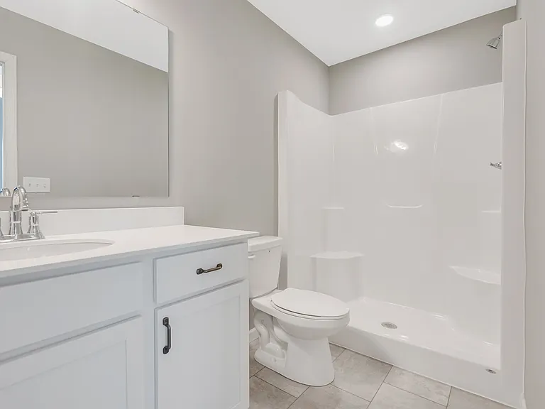 Upscale Master Bath With Step In Shower With A Seat.