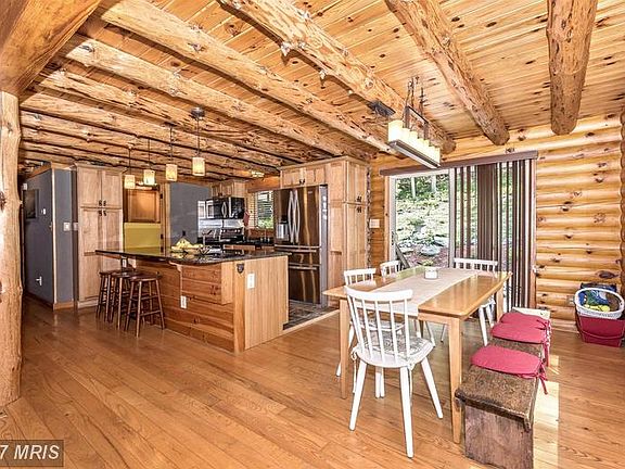 Kitchen/Dining room combo with slider to patio