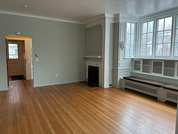Decorative fireplace. Wood floors.