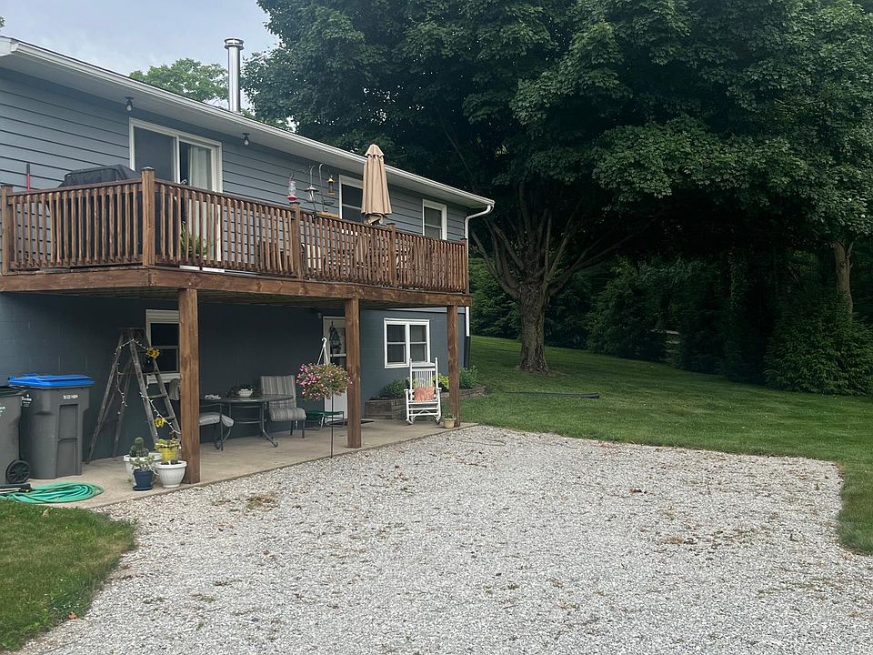 Entrance to lower level with 2 parking spaces and a turnaround.