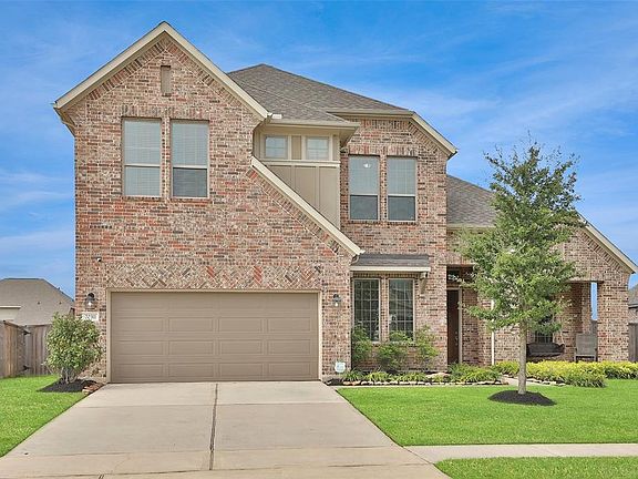 3 Car Tandem Garage with double wide driveway