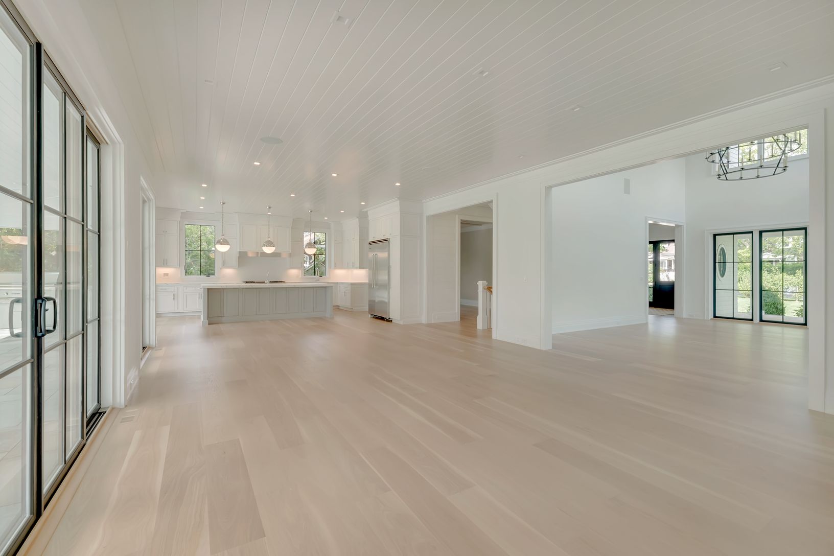 Expansive kitchen,informal dining, seating area opens onto the Great Room