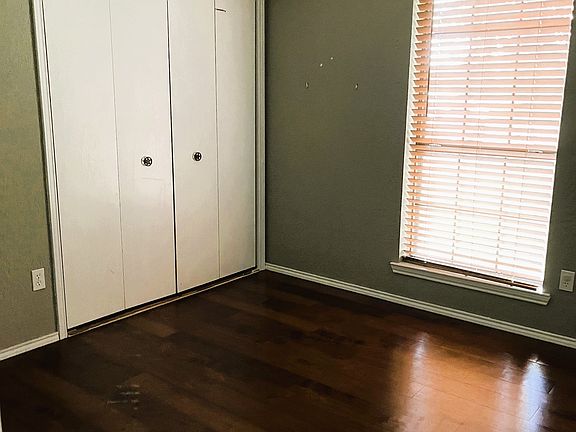 This is one of the 3 bedrooms. Master bedroom has attached bath.