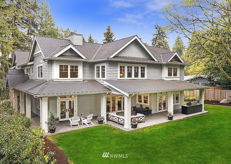 Better than new RKK Construction resale property nestled down a private lane on a large, level lot.