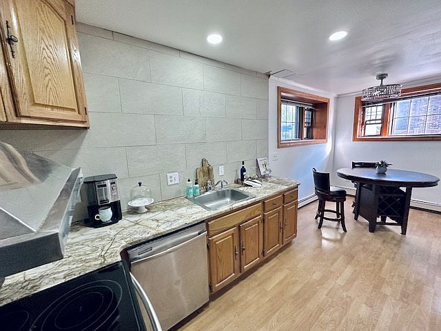 Kitchen/Dining room section of great room. High Ceilings.