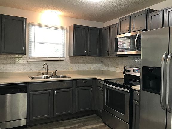 Kitchen window view of front yard