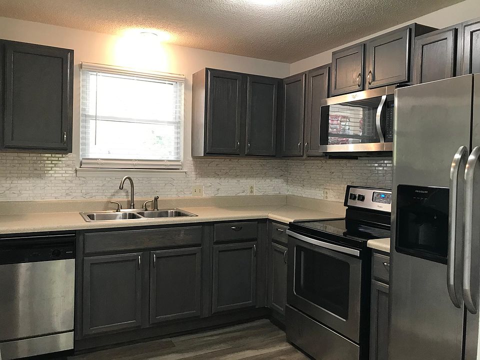 Kitchen window view of front yard