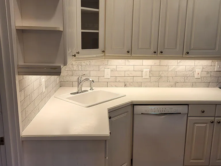 Includes a dishwasher