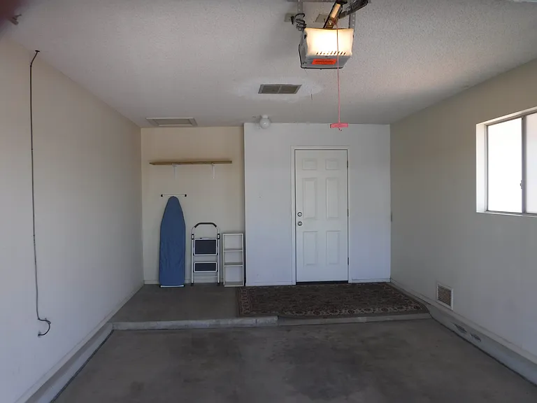 Inside garage. 1.5 spaces..