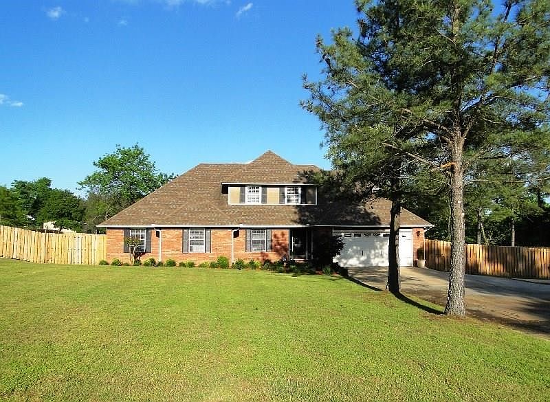 PEACEFUL COUNTRY with easy access to Hwy. 71. Located on 1 Acre in Greenwood School District.