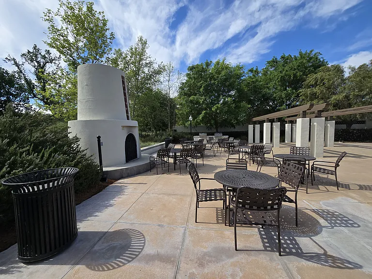 Private community patio with seating and social space
