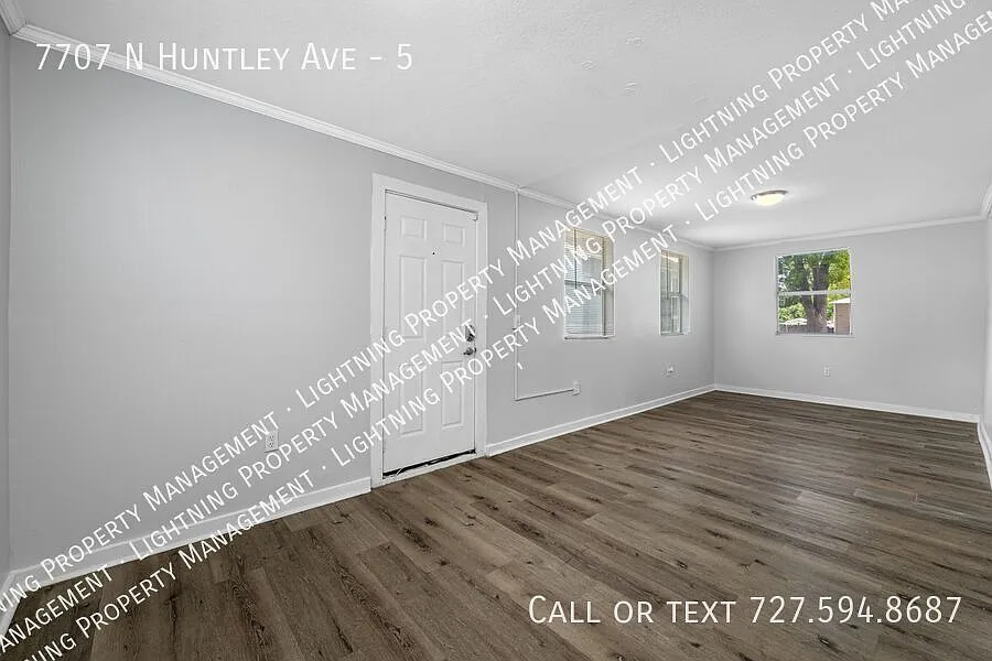 Building Photo - 7707 N Huntley Ave #5