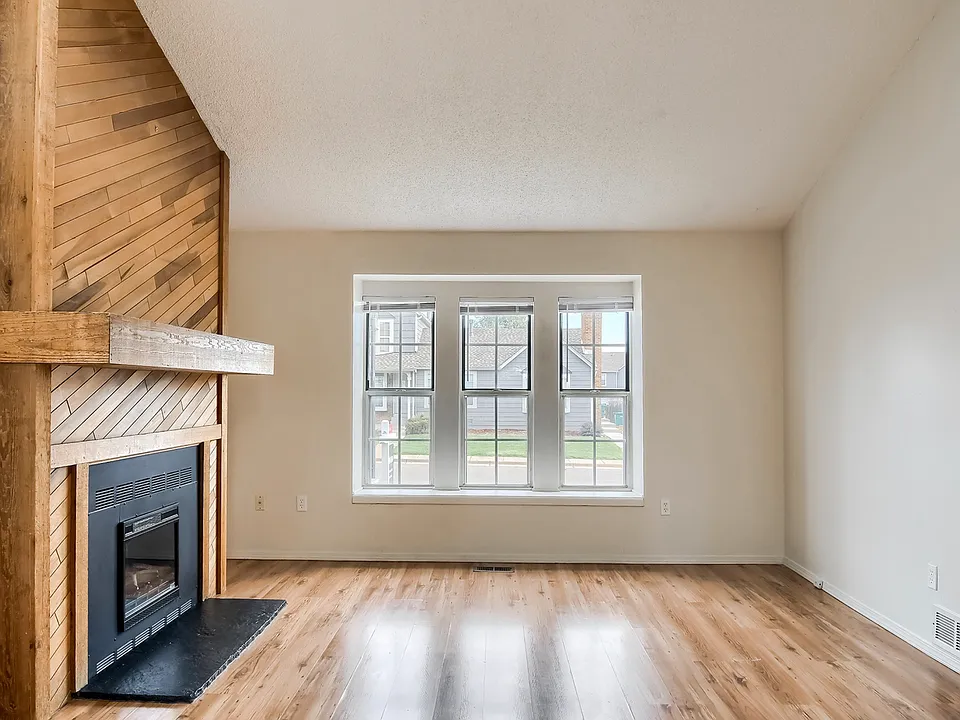 Large living room with electric fireplace