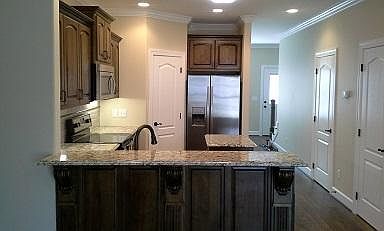 High end appliances, beautiful granite, large pantry