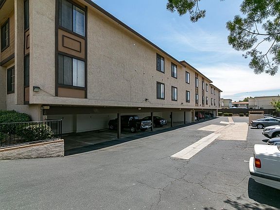 Adjoining parking reserved for private use by complex residents and their guests.
