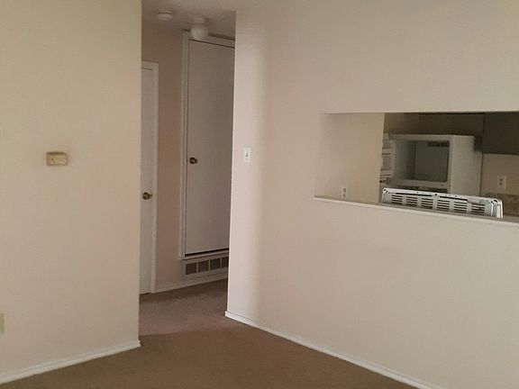 Living room looking toward kitchen