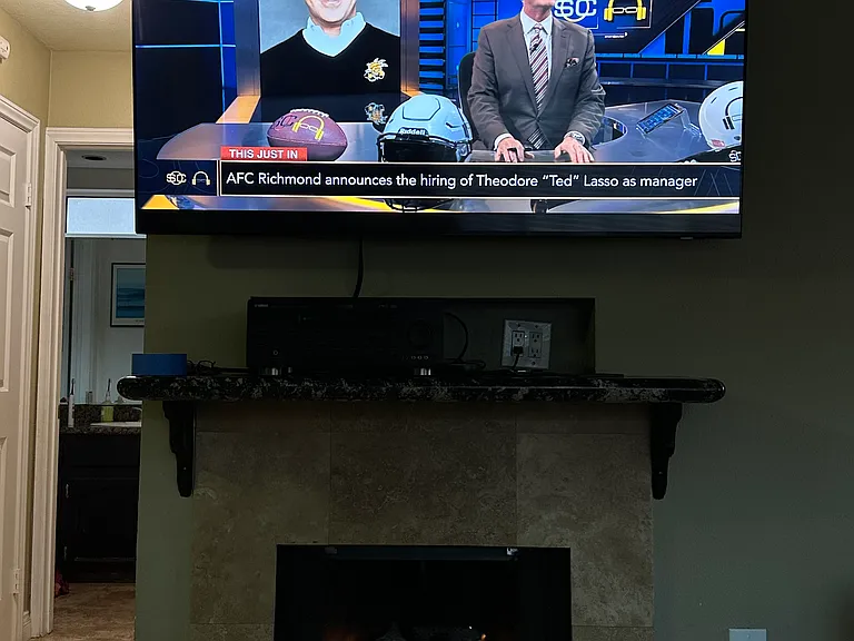 Brand new 65 inch TV, gas fire place