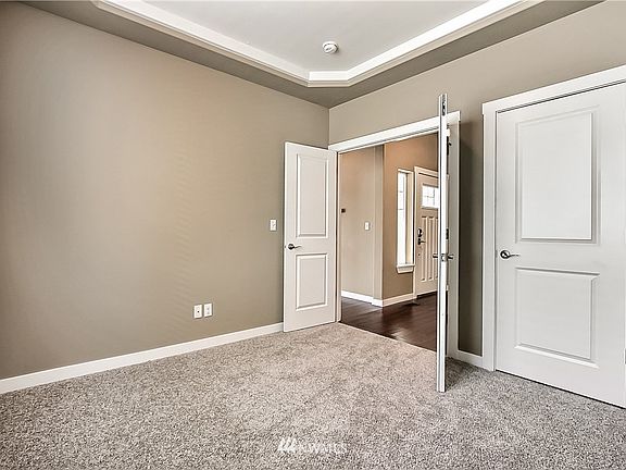 First floor office/bedroom with French doors. 