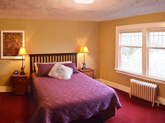 Large bedroom with windows to the west.