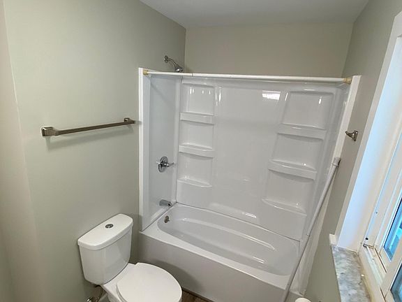 everything in bathroom is new, tub,sink,vanity, lighting and toilet