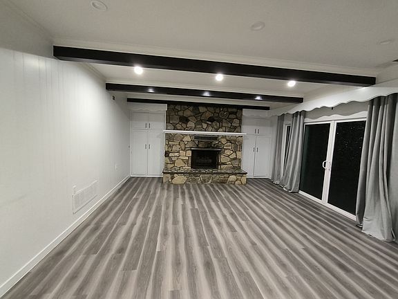 Large family room, dining area in front of open kitchen