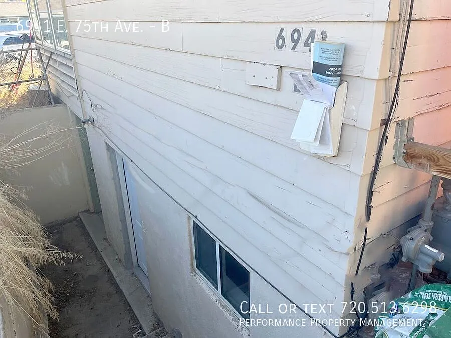 Building Photo - 6941 E 75th Ave #B