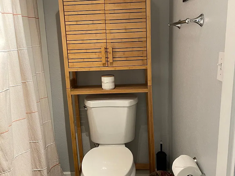 The bathroom is connect to both rooms with locking doors.