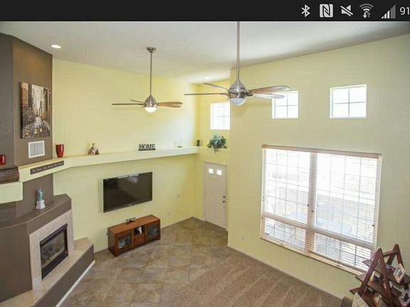 Huge family living space. High Ceilings. Fans help reduce A/C expense.