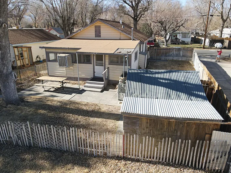 Back yard w/ two sheds