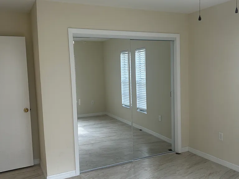 bedroom 2 mirror closet doors