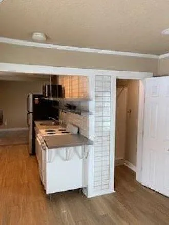 view to the kitchen from living room