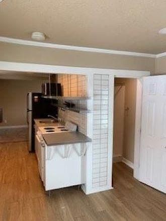 view to the kitchen from living room