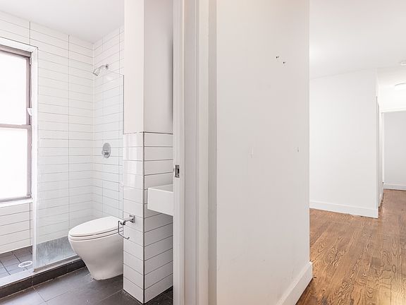 2nd image of 117 E 7th St APT 1A