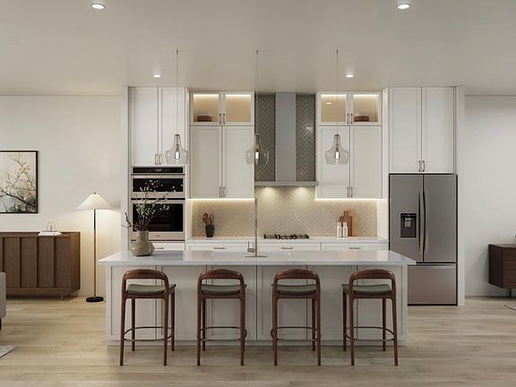 Large Island, Ceiling Height Cabinets and Under-cabinet Lighting.