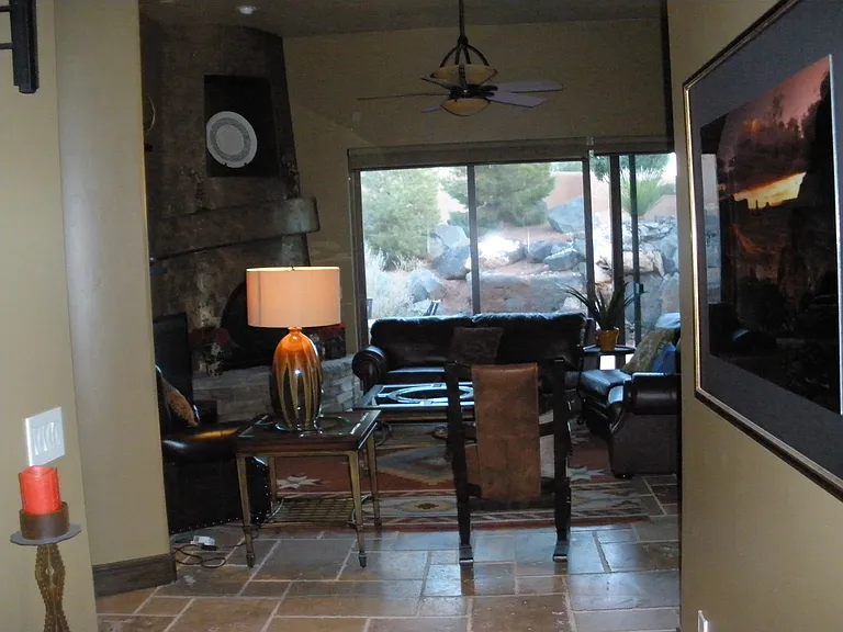 another view of hallway from front door into living room