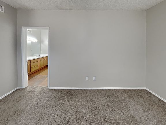 Brightly lit, spacious room wi