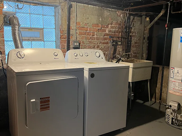 FREE laundry facilities in the basement of the front house - 20 ft. walk from unit to basement
