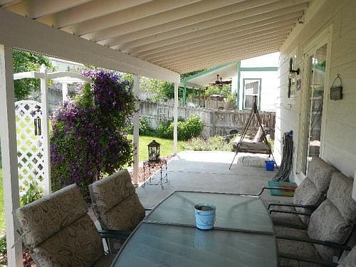 Covered porch full width of house