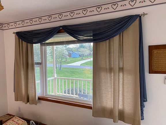 Den Large Window to Porch