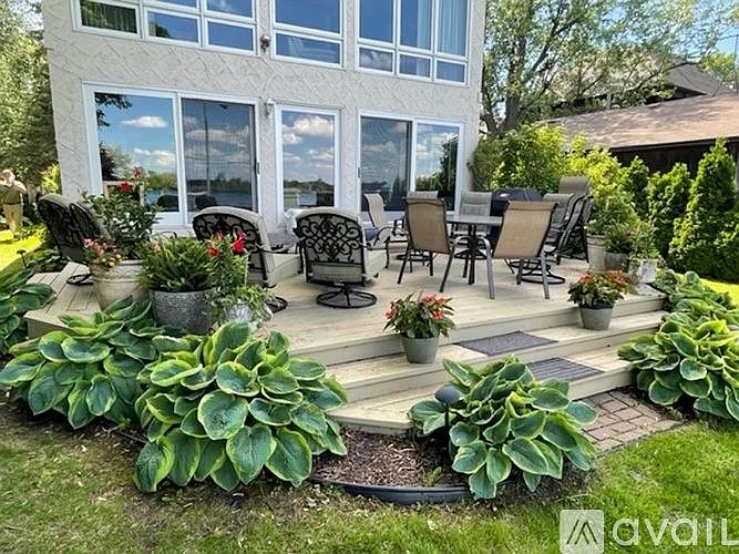 Deck with Gas BBQ from house nature gas so no propane tanks to struggle with.