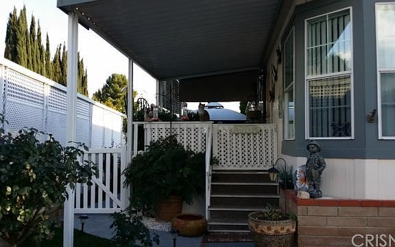 Private walk up porch. Fenced to keep your pets in.