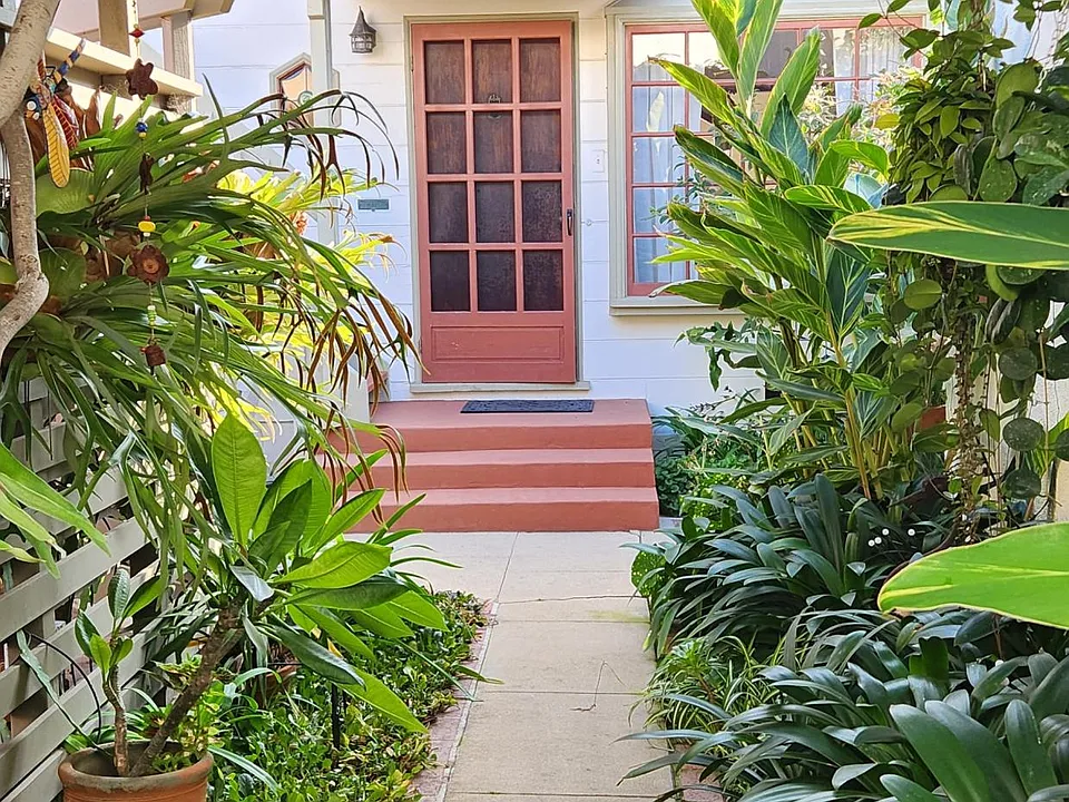 Garden walk way to duplex.