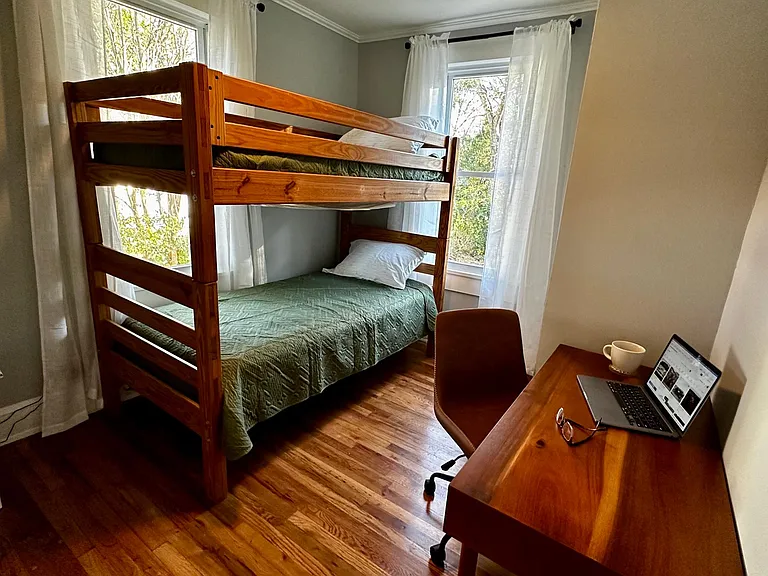Bunk room with work station