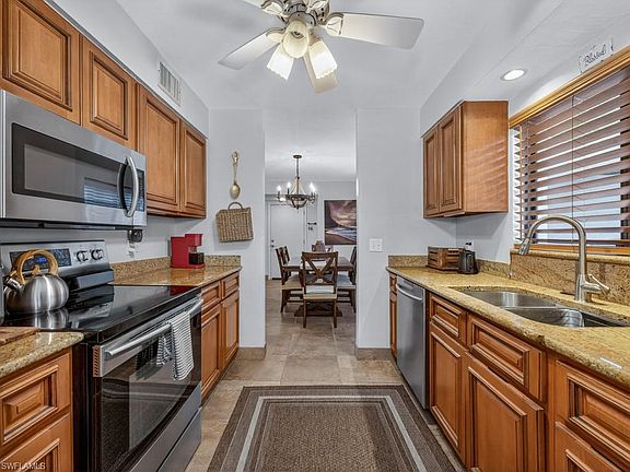 5th image of 910 VANDERBILT BEACH RD #317W