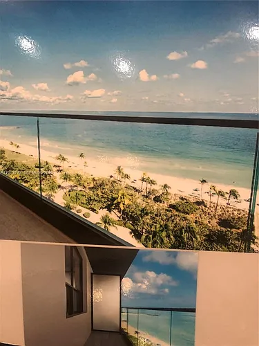 10185 Collins Ave Photo 1