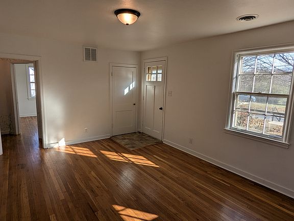 View of front door from dining area