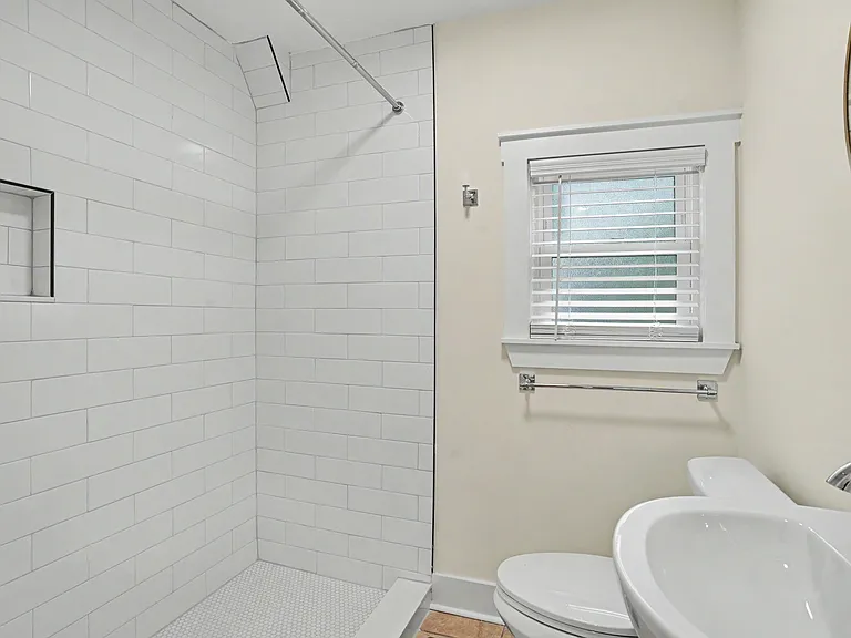 Bathroom 1 (located downstairs) with walk-in shower