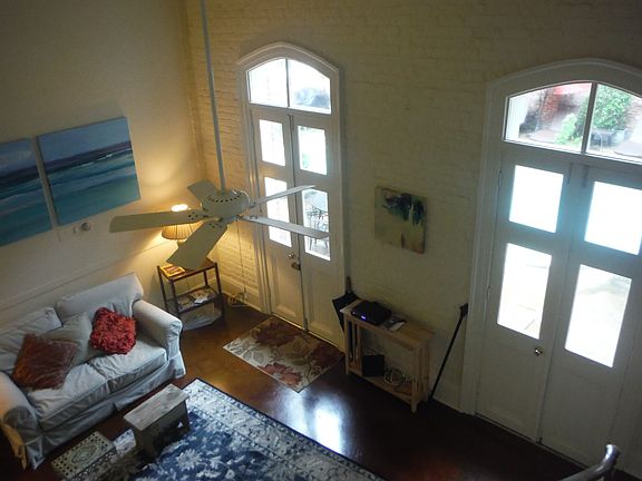 LOOKING AT LIVING FROM STAIRS